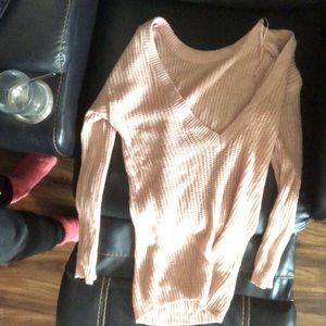 medium pink sweater, only worse once.